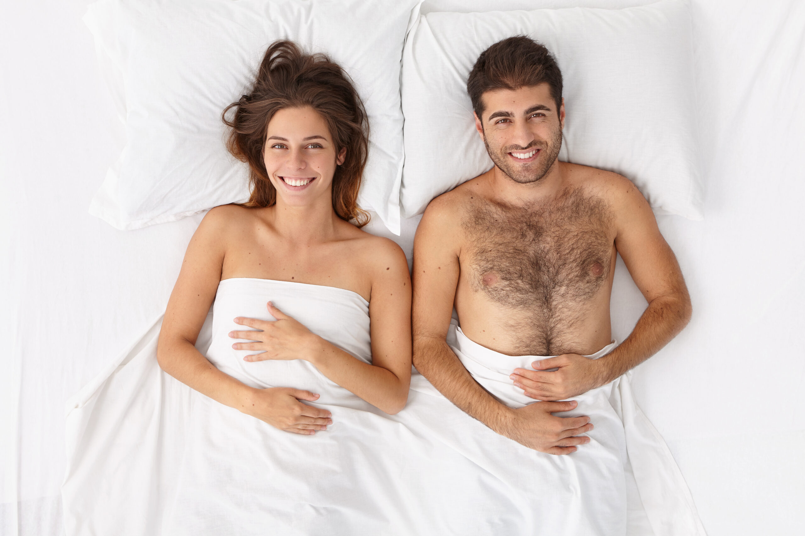 Close Up Couple Lying Bed White Blanket Scaled